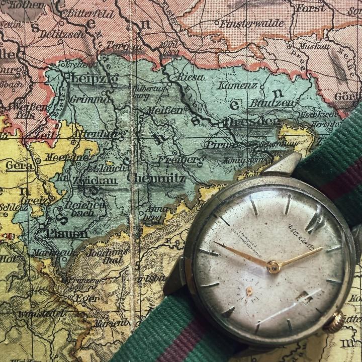 Historische Karte von Sachsen mit einer Uhr